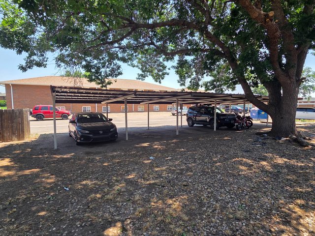 Property Photo 5 Carports Behind Building
