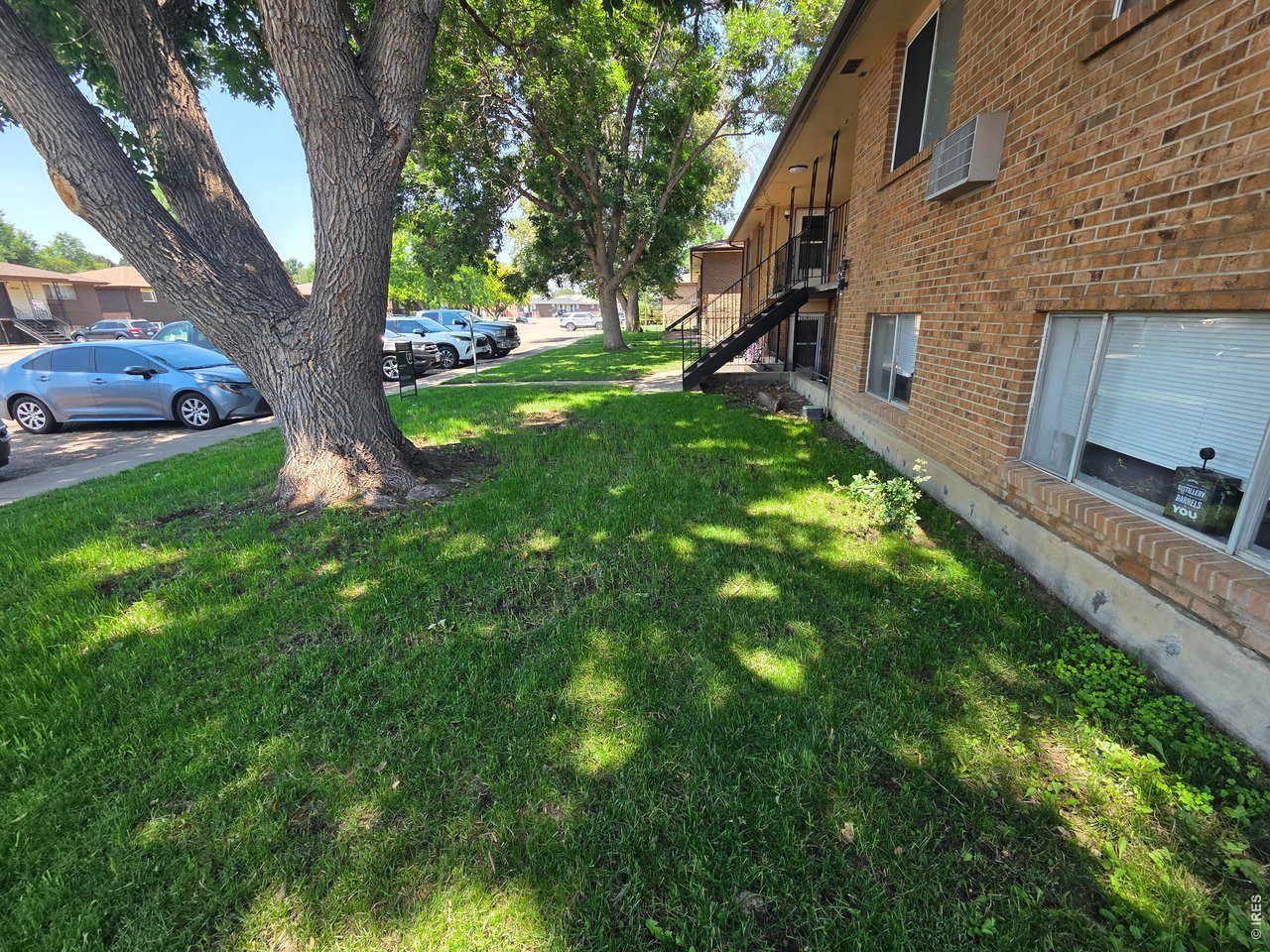 Property Photo 2 Front and Parking