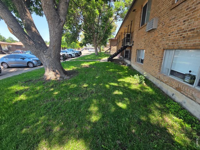 Property Photo 2 Front and Parking