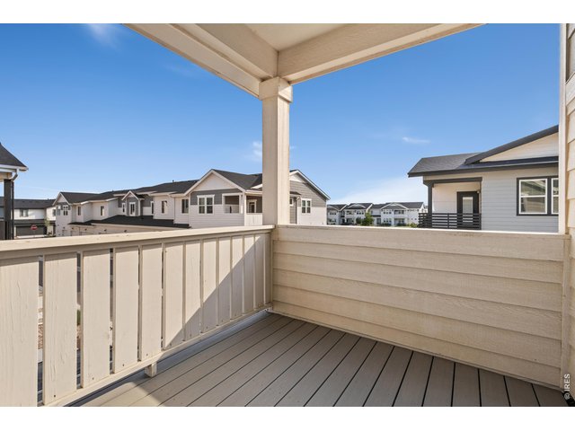 Property Photo 14 Lovely spacious balcony to enjoy a sunset or morning cup of coffee.