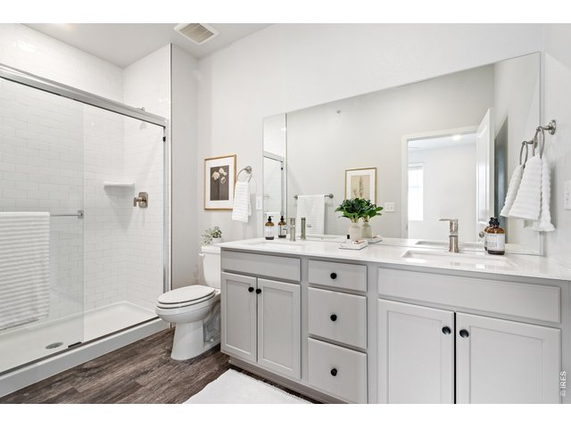 Property Photo 11 Spacious primary bath with walk in shower.