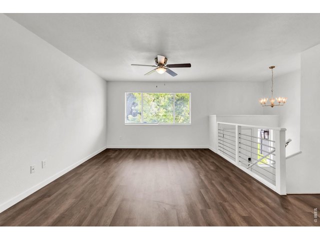 Property Photo 10 Buyers will appreciate the peace of mind that comes with new luxury vinyl plank flooring and new carpet.
