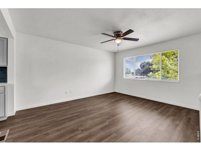Property Photo 11 Throughout the home you'll find new doors, trim, lighting, ceiling fans, fixtures, mirrors, hardware, blinds, switches, receptacles, vent covers, fresh paint, updated stair railings, and countless designer touches.