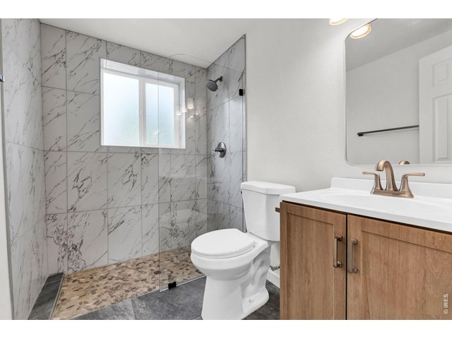 Property Photo 39 Lower level 3/4 bathroom with luxury features
