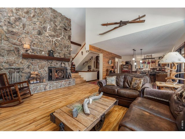 Property Photo 5 Floor-to-ceiling mossrock, fireplace