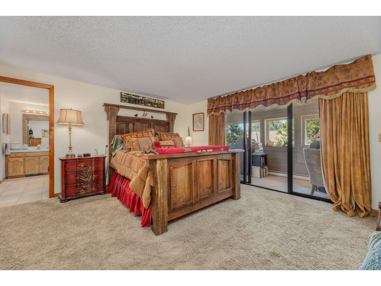 Primary Suite with access to heated sunroom