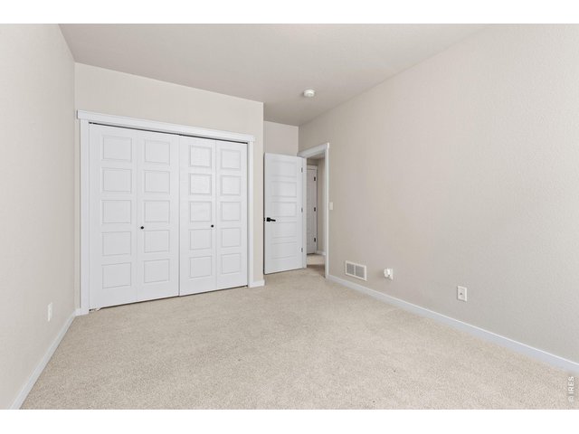 Property Photo 26 Basement bedroom 4
