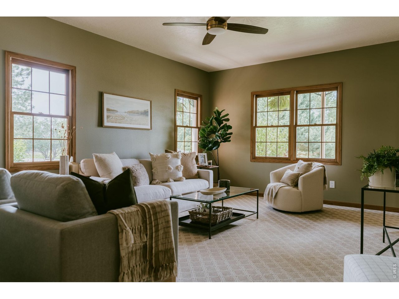 Property Photo 11 Family room filled with natural light and views