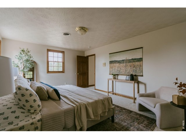 Property Photo 25 Primary Suite w/ Views of Devil's Backbone and Foothills