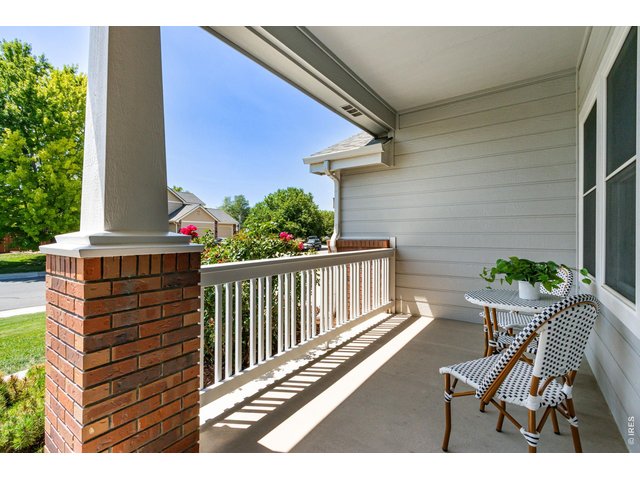 Property Photo 19 South facing covered front porch 20 feet long!
