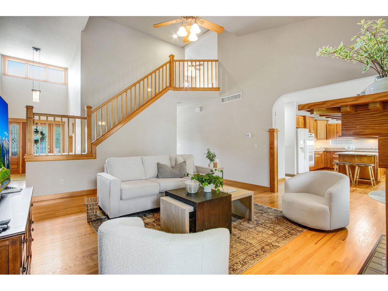 Property Photo 10 Winding staircase to 2 spacious Bedrooms and Loft area, Main Level features a welcome main level living area!