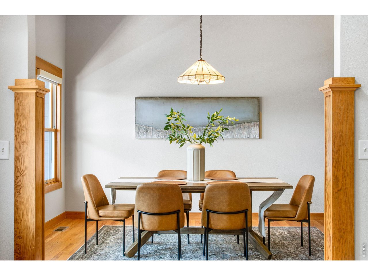 Property Photo 8 Detailed Millwork throughout, and soaring ceilings, front dining room!