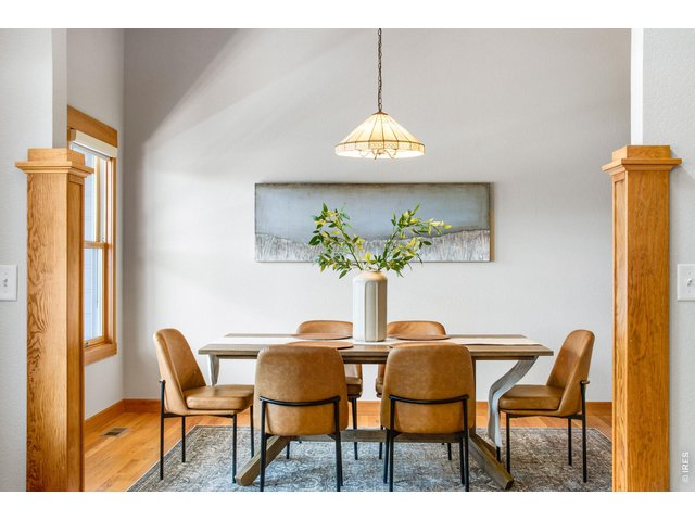 Property Photo 8 Detailed Millwork throughout, and soaring ceilings, front dining room!