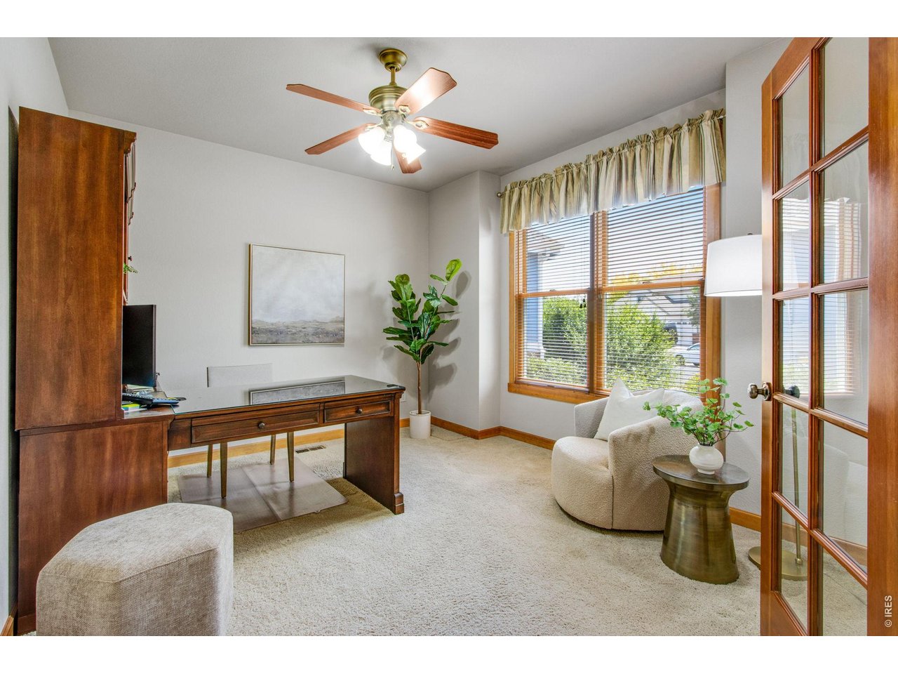 Property Photo 15 Front office 13 X 12, with french doors and oversized picture window! Comes with the desk!