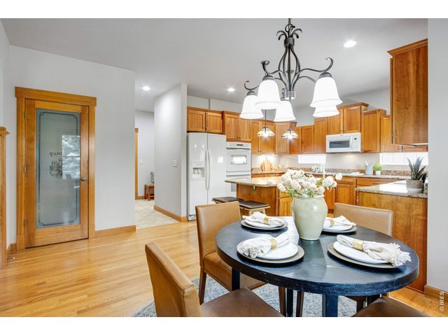 Property Photo 22 Walk-in Pantry, Sunny Breakfast Nook, loaded with Cherry cabinetry! Wonderful workspace!