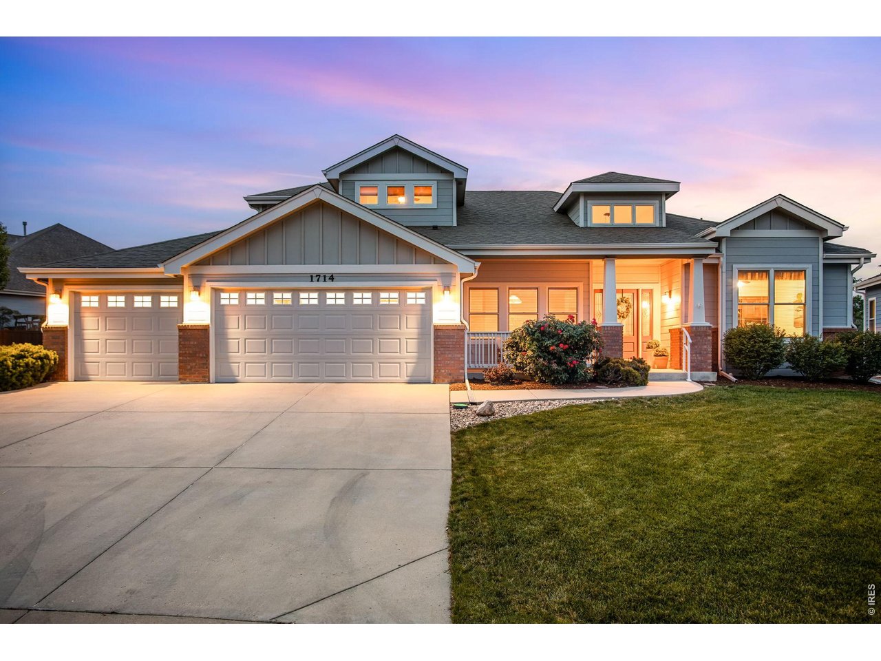 Property Photo 7 Spacious driveay, Gracious & Distinquished curb appeal with both a gabled & hibbed roof line.