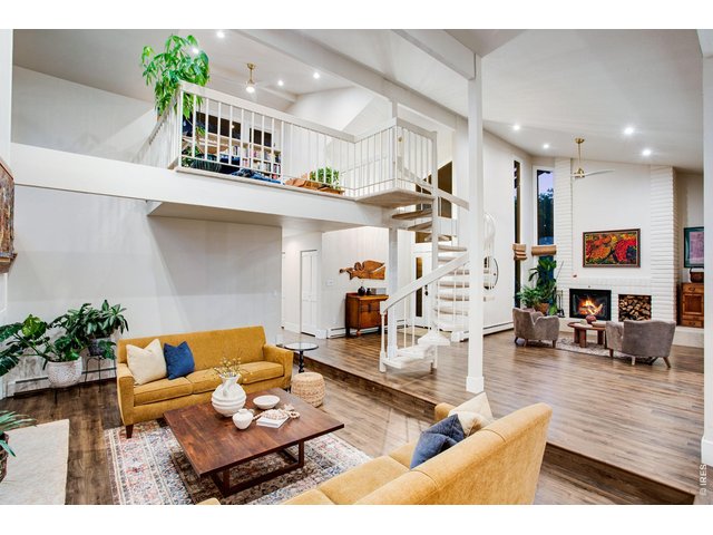 Property Photo 18 Spiral Staircase to the Upstairs Loft/Library or Office!