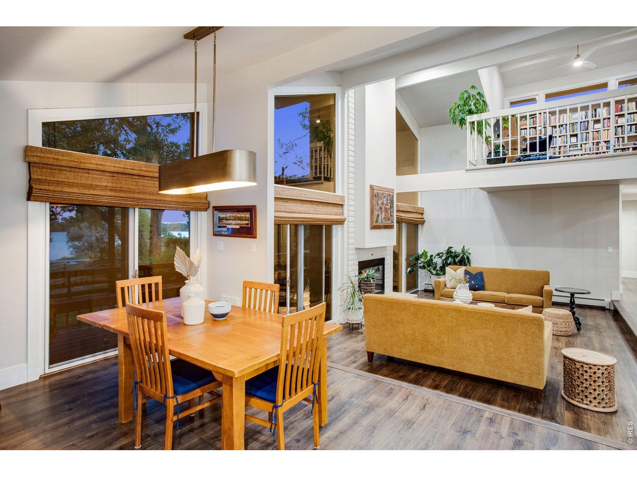 Property Photo 15 Dining Room Open to Sunken Living Room
