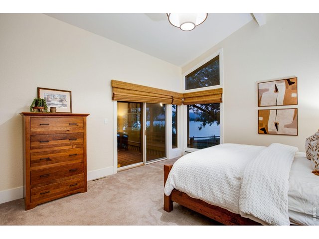 Property Photo 31 Primary Bedroom with Deck Access!