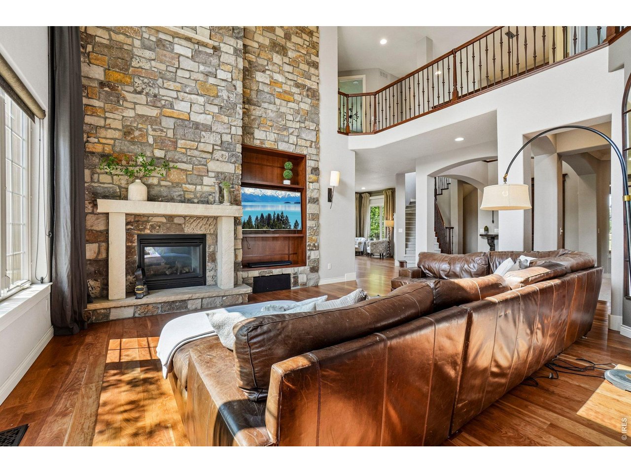 Property Photo 9 Great room with 2 story stone fireplace