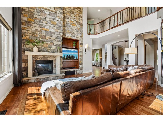 Property Photo 9 Great room with 2 story stone fireplace