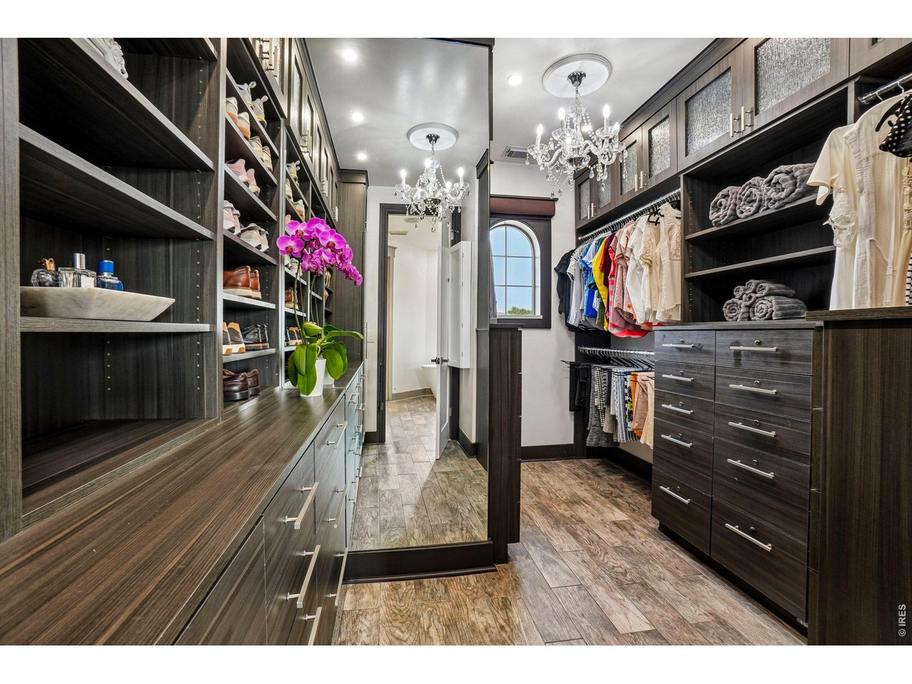 Property Photo 25 Custom primary closet with tons of organizational options