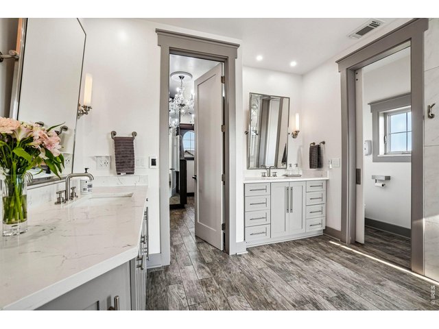 Property Photo 24 Plenty of space to dress up or unwind in the primary bath and closet area