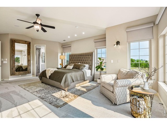 Property Photo 22 Primary suite with motorized blinds and tons of space to feel pampered