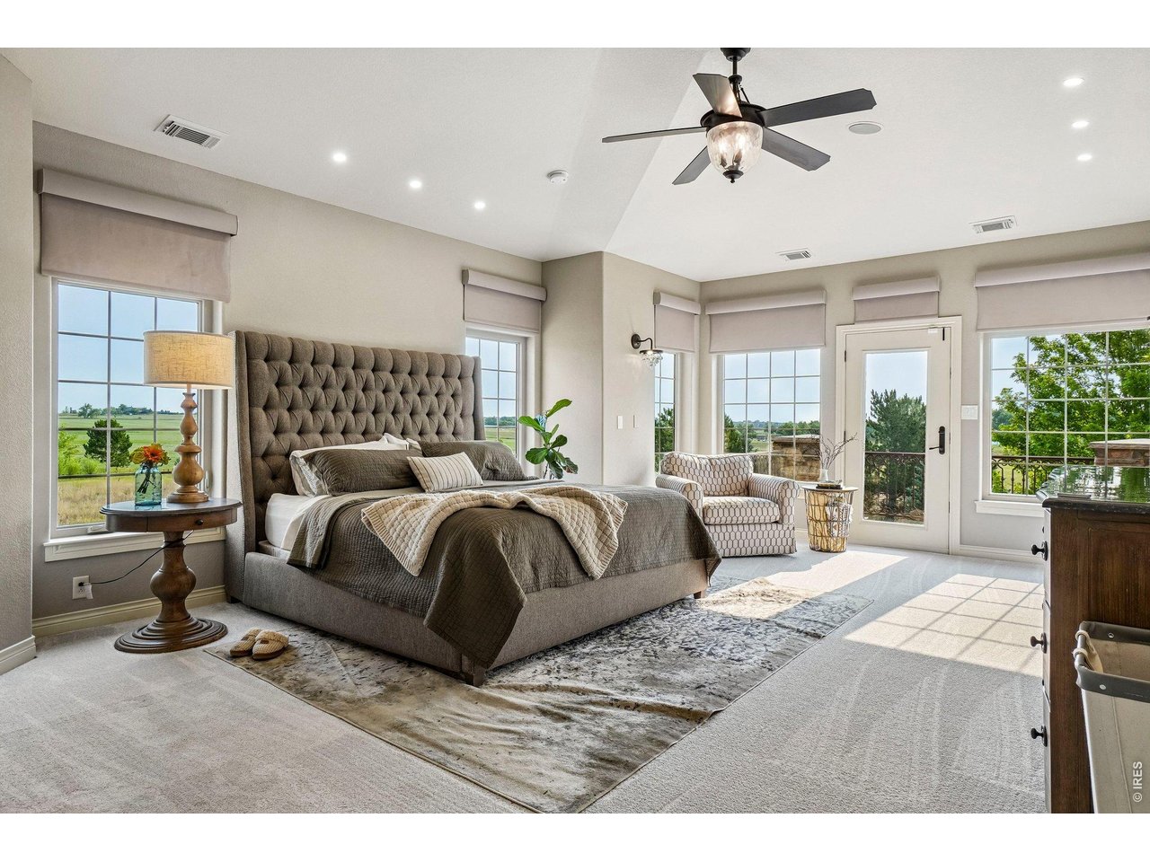 Property Photo 21 Primary suite has it's own east facing balcony - perfect for morning coffee watching the sunrise