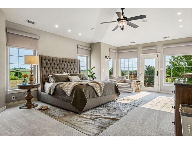 Property Photo 21 Primary suite has it's own east facing balcony - perfect for morning coffee watching the sunrise