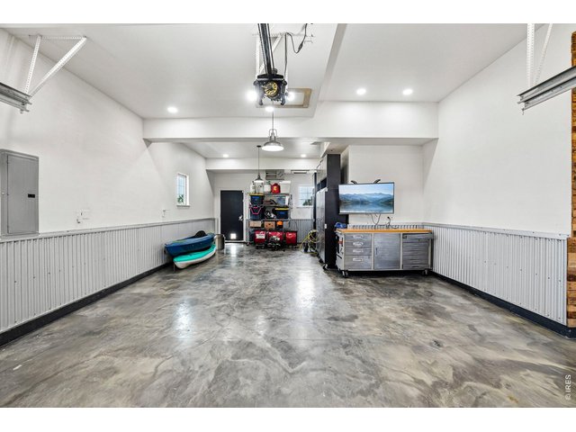 Property Photo 36 Garage offers lots of options for work space, man cave and a great hobby space