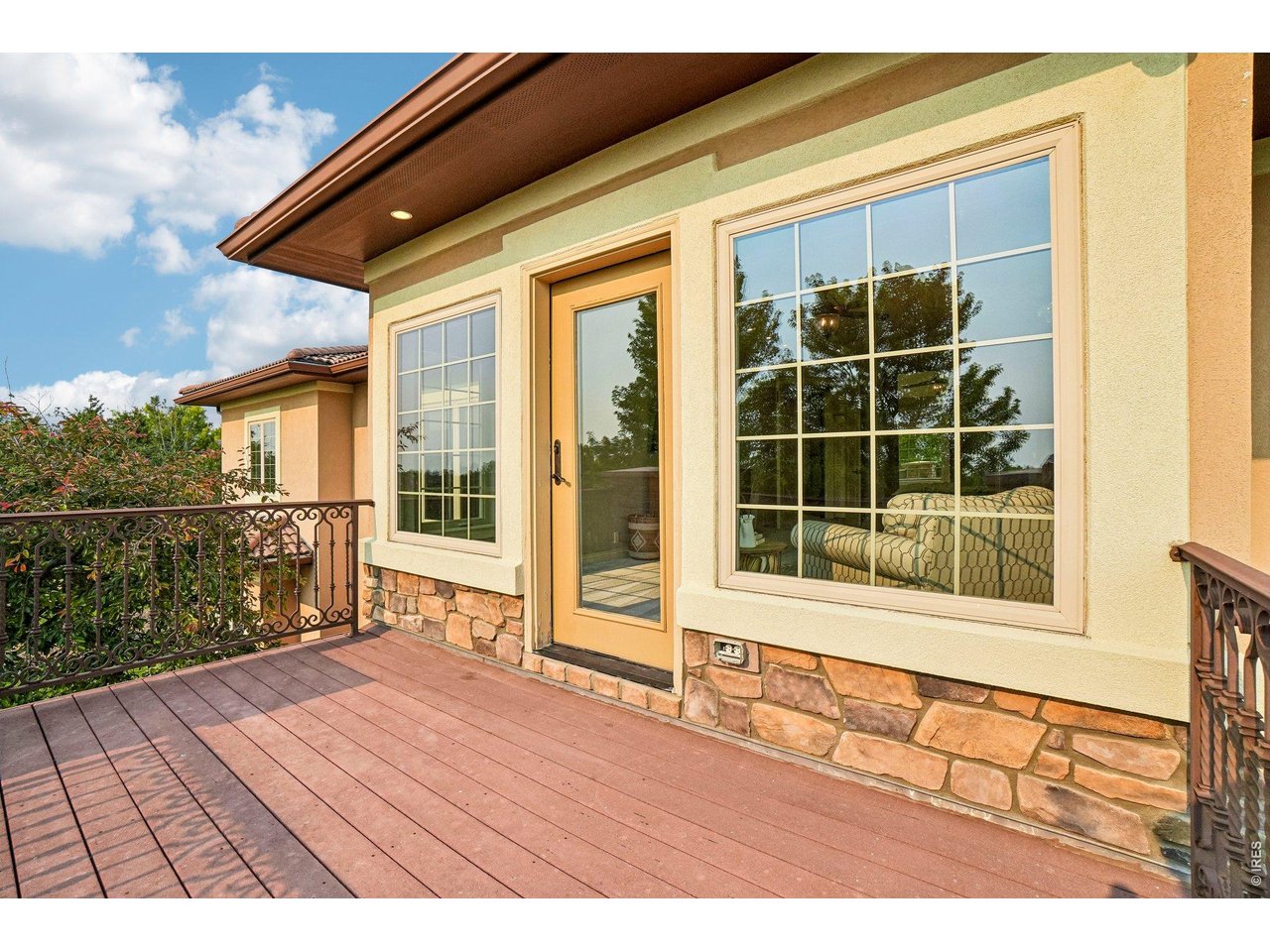 Property Photo 39 Primary bedroom balcony faces east