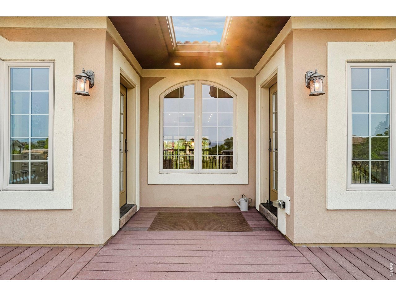 Property Photo 42 Front balcony has doors from bedroom 2 and the hallway for easy access to watch the sunsets