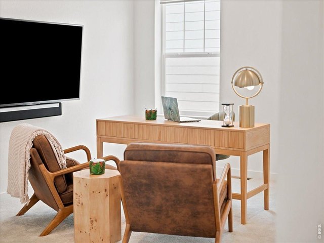 Property Photo 12 Common area upstairs is great flexible space.