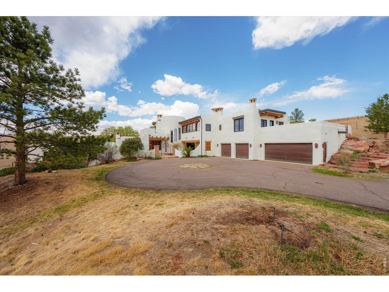 Property Photo 3 Where nearly three (2.88) acres of serene landscape meet timeless architecture and modern refinement.