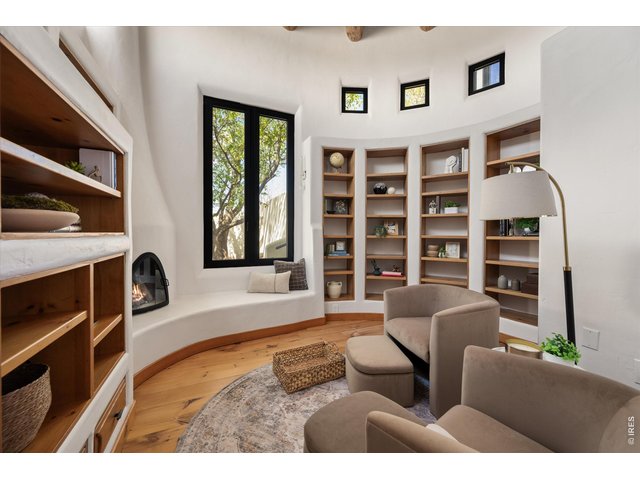 Property Photo 26 The primary suite is a true sanctuary, complete with a private library, hidden storage, spa-inspired bath with steam shower and soaking tub, and a separate jacuzzi room designed for ultimate relaxation and health.
