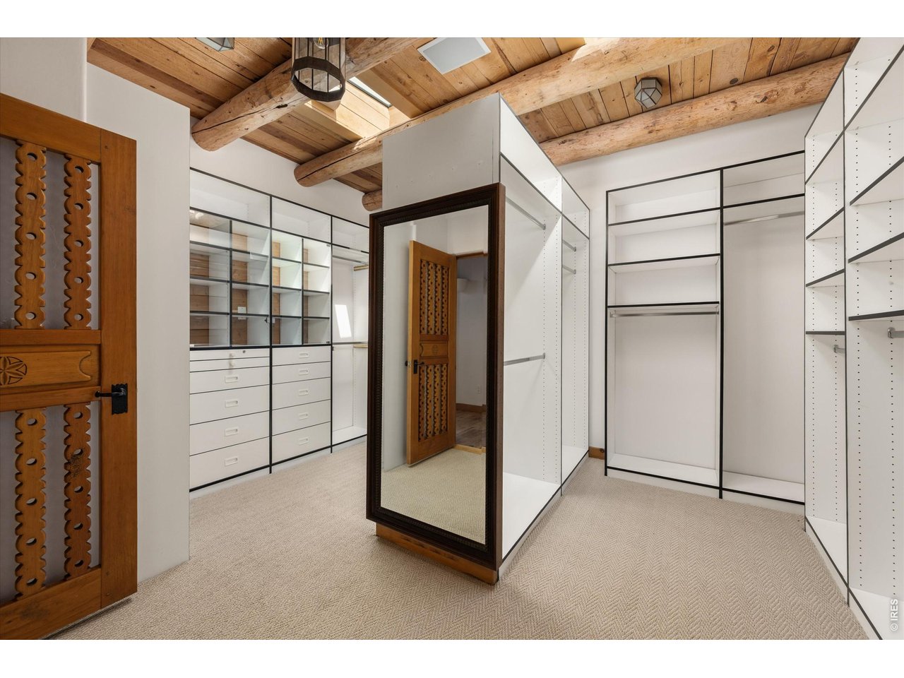 Property Photo 29 17 x 14 Walk-in closet with closet system ready for all your beloved items.