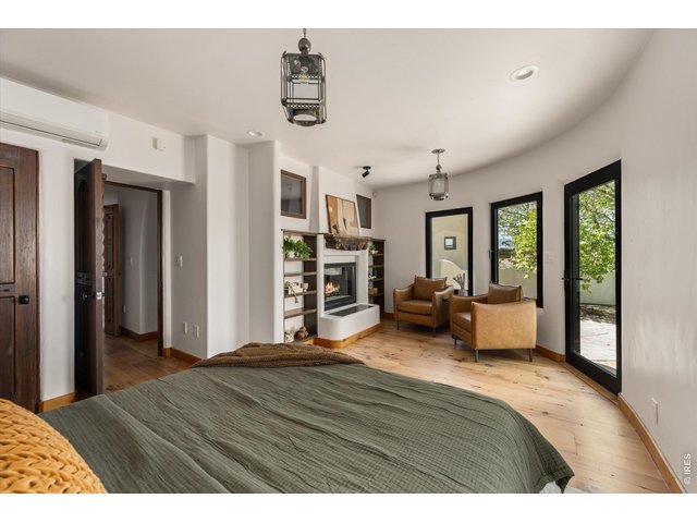 Property Photo 37 Bedroom 2 - 19 x 15 with access to its private courtyard.
