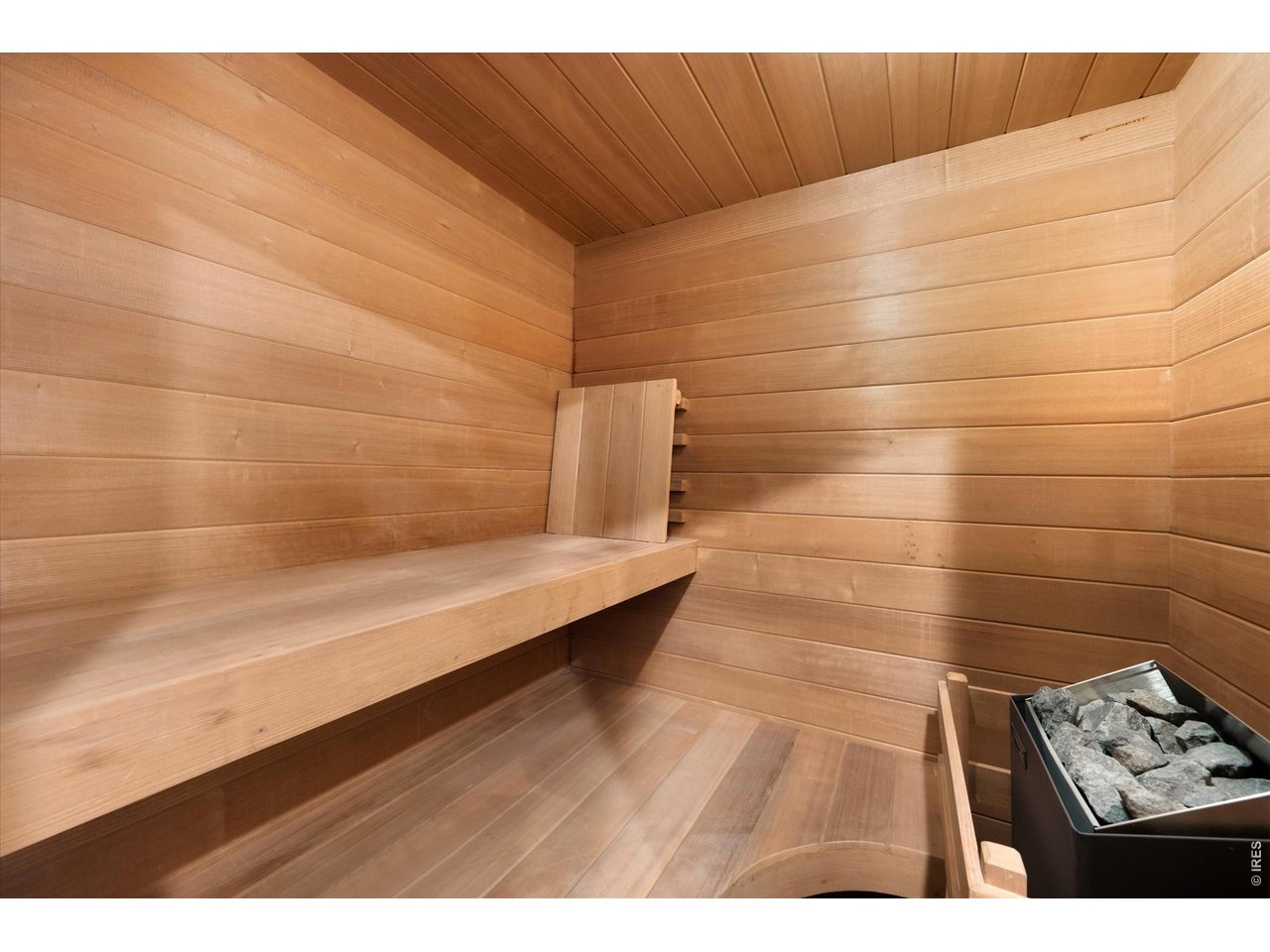 Property Photo 42 Escape to your private dry sauna, a warm and tranquil retreat designed for relaxation and rejuvenation.