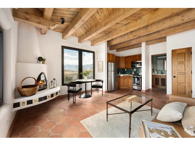 Property Photo 43 A private guest suite with separate entrance, full kitchen and bath, bedroom, and its own patio, offering complete flexibility with the option to lock off from the main home.
