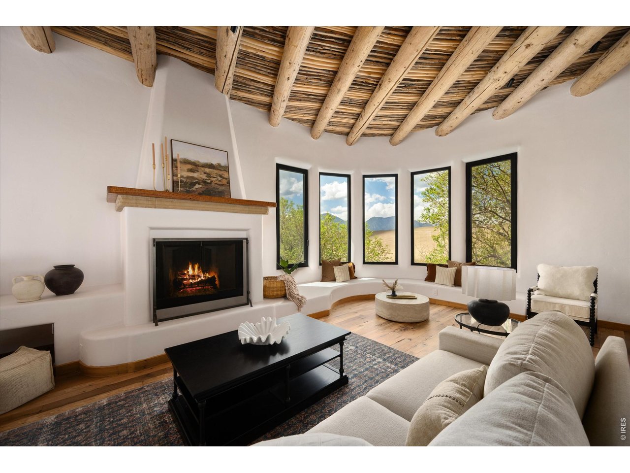 Property Photo 7 Eight fireplaces anchor the home with warmth and character.