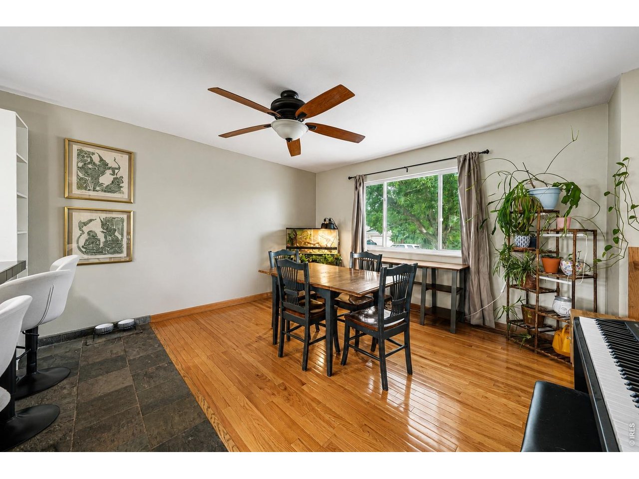 Property Photo 5 Large dining area with hardwood flooring