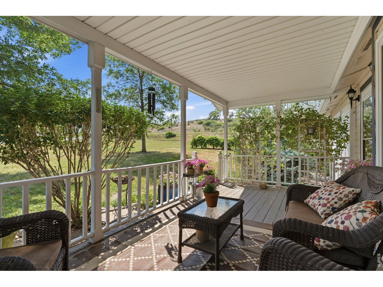 Property Photo 10 Inviting front porch to relax on!