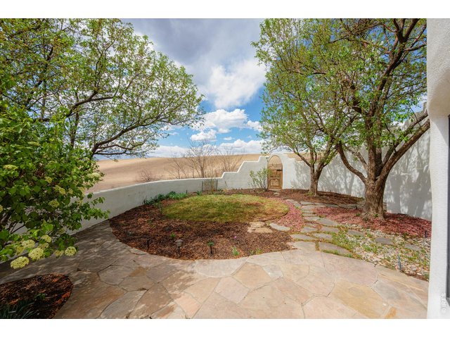 Property Photo 38 A series of three enclosed courtyards creates a true indoor-outdoor lifestyle, inviting natural light, quiet reflection, and effortless entertaining at every turn.