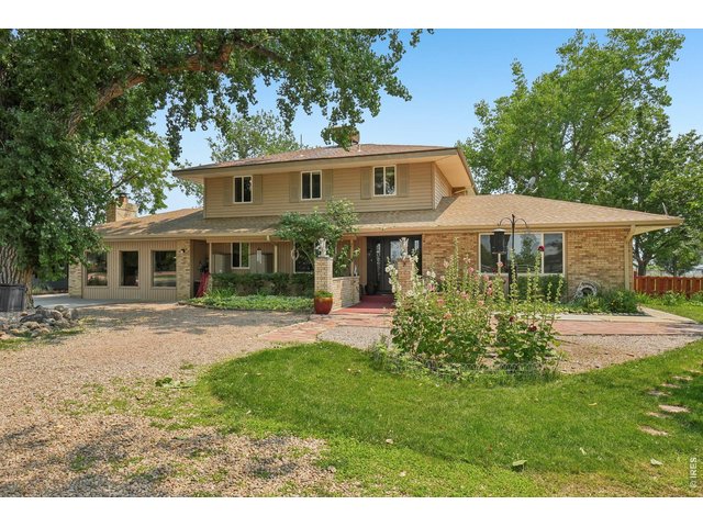 Property Photo 2 Beautiful 5+acres - this is the main house from the front entrace