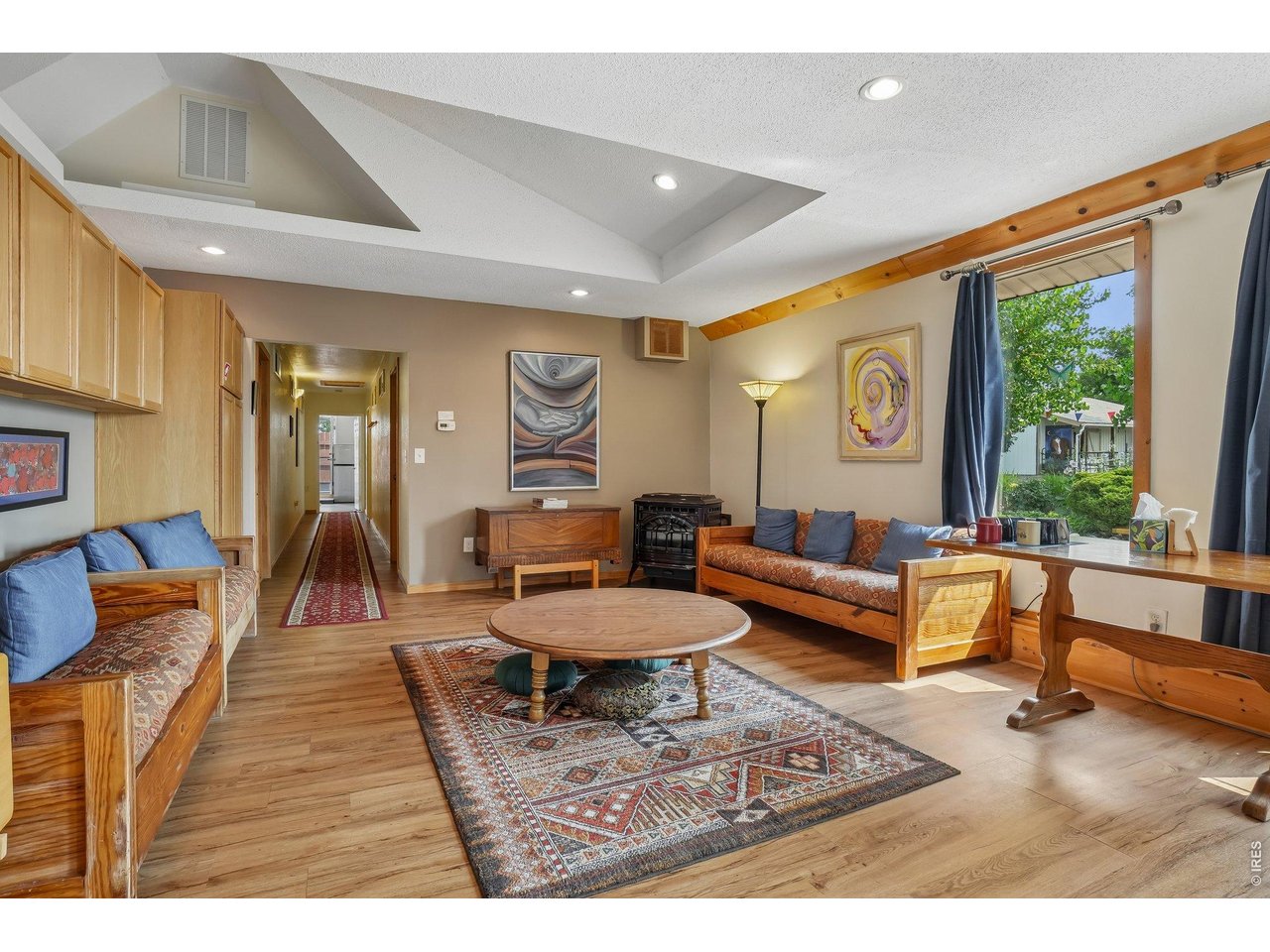 Property Photo 23 North side of the house is currently used as a Zen center - these rooms offer great flex space for home based businesses or multi generational living.
