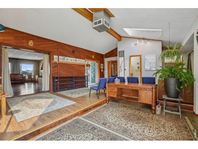 Property Photo 25 Large gathering space currently being used as a Zen retreat area