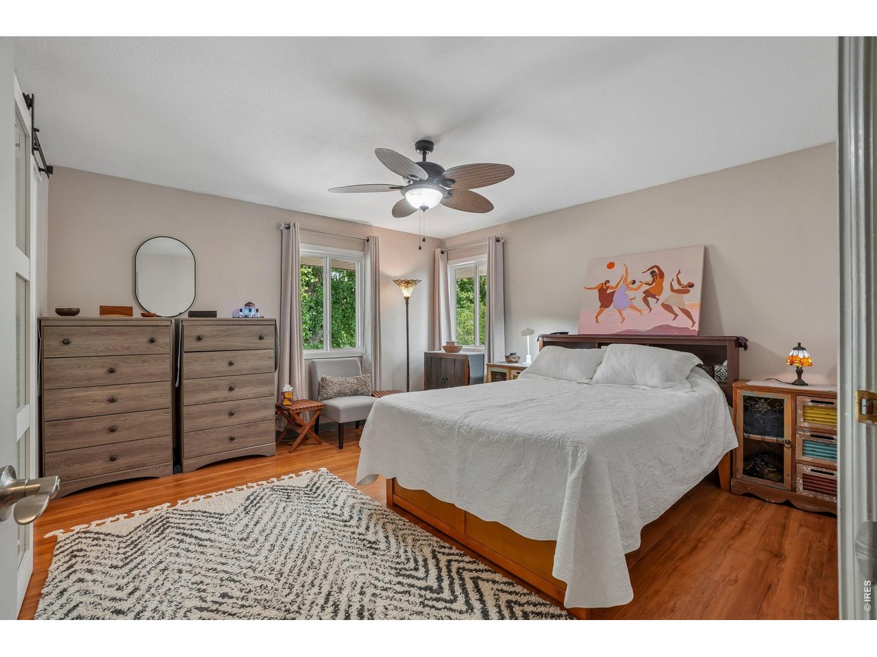 Property Photo 43 Upstairs primary bedroom in main house with attached bath