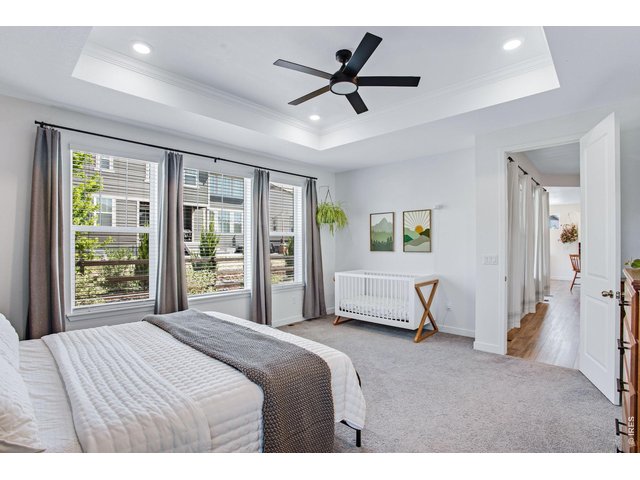 Property Photo 19 oversized primary bedroom with extra room for baby, your desk, or your personalized reading corner