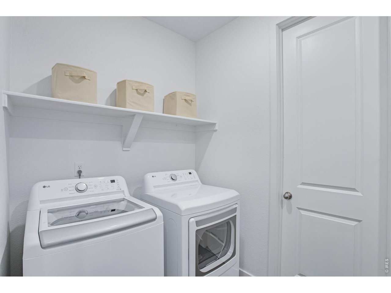 Property Photo 22 large laundry room with tons of storage!
